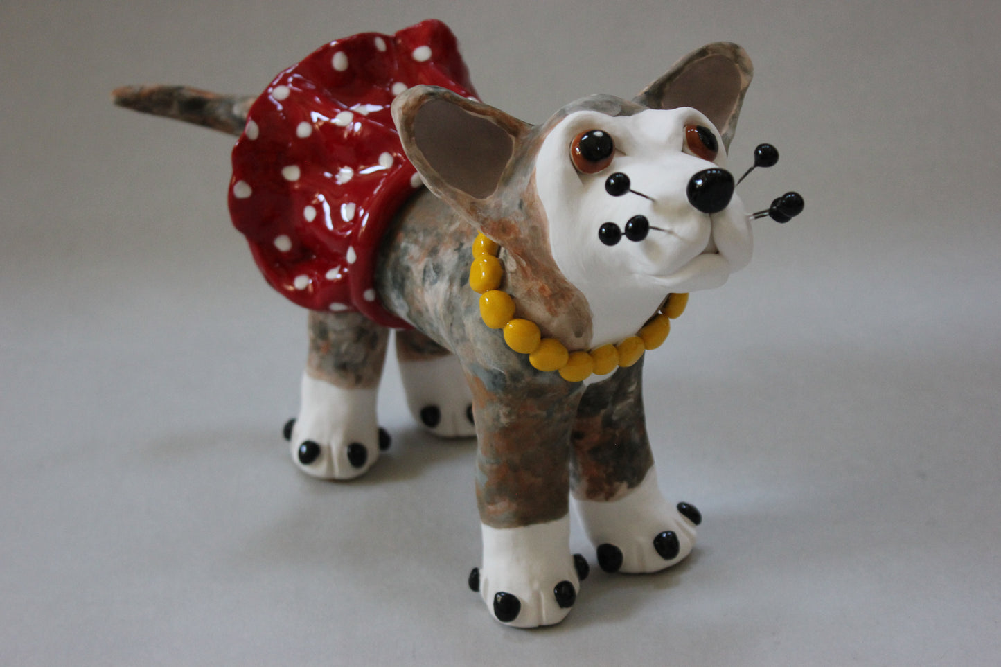 Brindle Dog in Skirt and Pearls Dog Sculpture