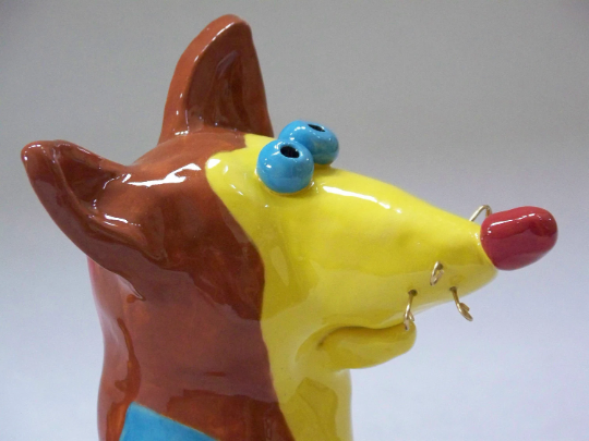 Cartoonistic Brown and Yellow Dog Sculpture